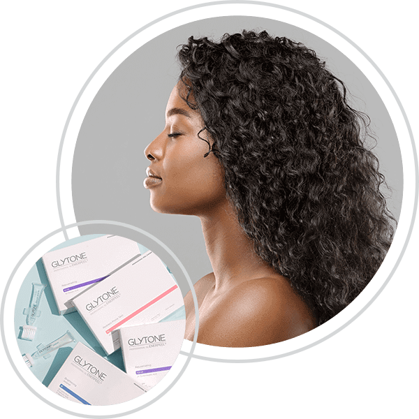 Profile of a young woman with skincare products