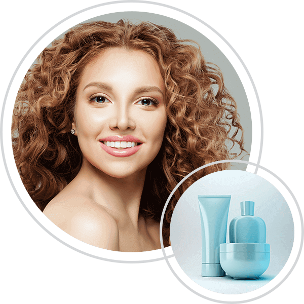 Smiling young woman with curly hair and skincare products