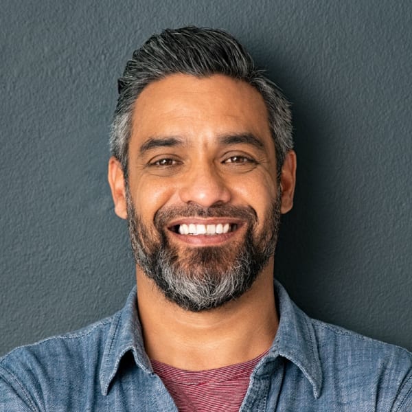 Portrait of smiling middle eastern man with beard